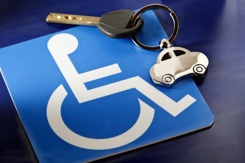 Wheelchair symbol and a set of car keys